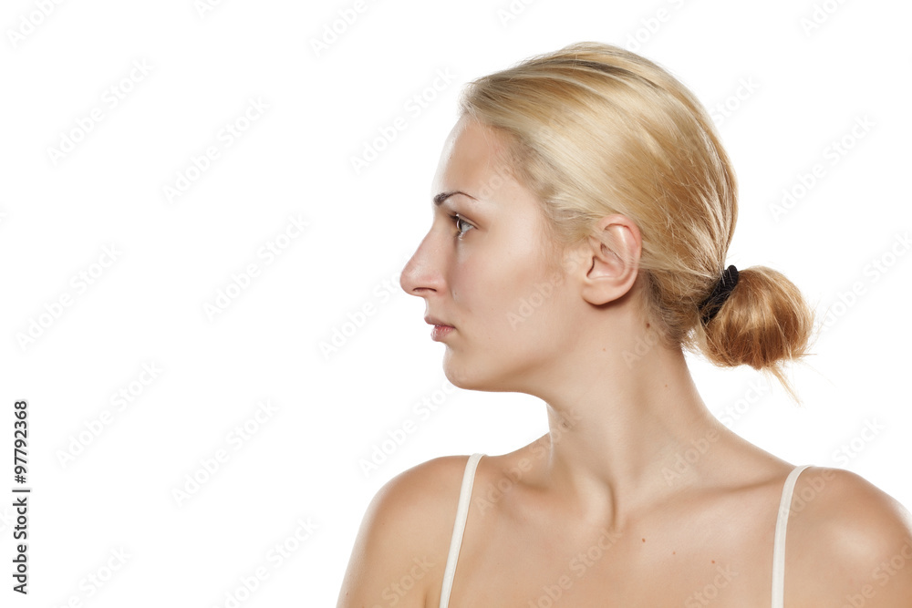 profile of a young woman without make-up