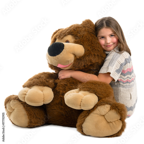 Portrait of a beautiful girl with great teddy bear