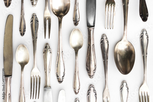 beautiful sterling cutlery set on white background