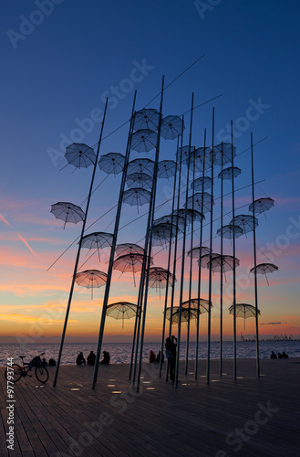 Sunset at Thessaloniki umbrellas sculpture photo