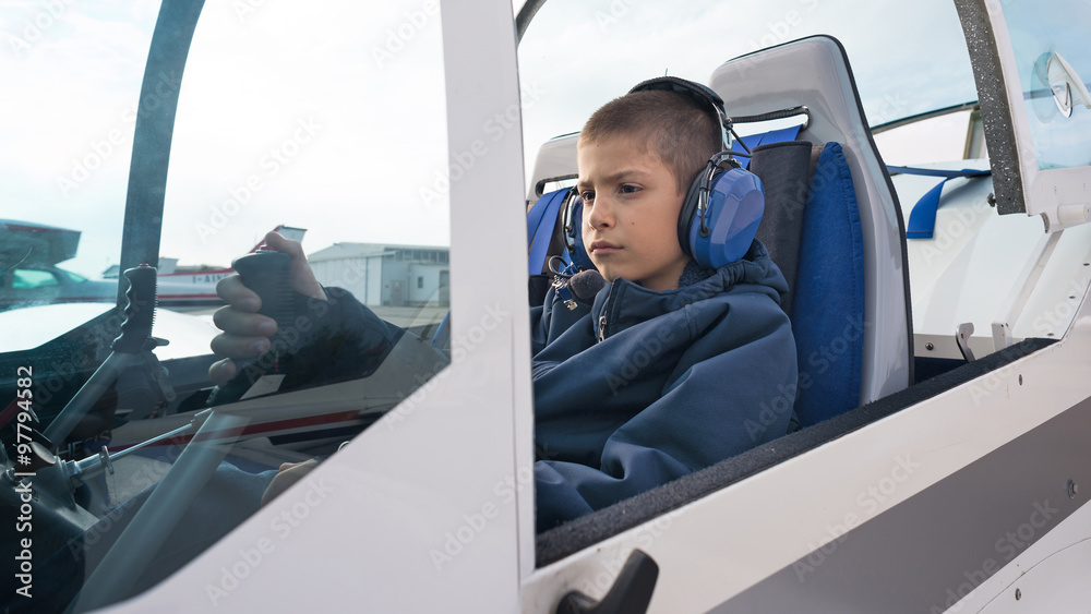 Young kid airplane pilot portrait inside cockpit Stock Photo Adobe Stock