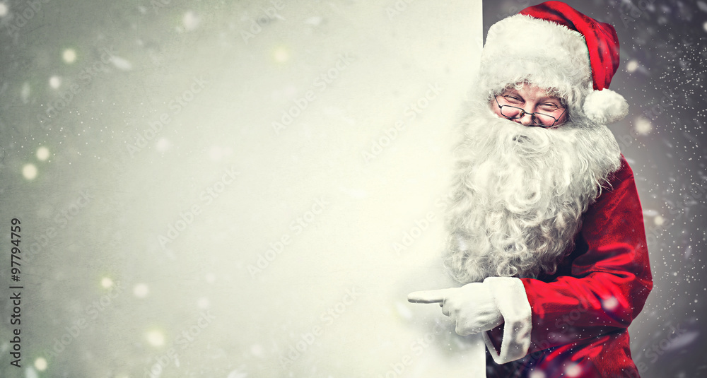 Smiling Santa Claus pointing on blank advertisement banner background with copy space - obrazy, fototapety, plakaty 