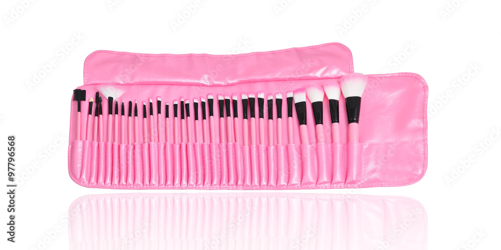 Purple bag of makeup brushes isolated on white background Purple bag of makeup brushes isolated on white background