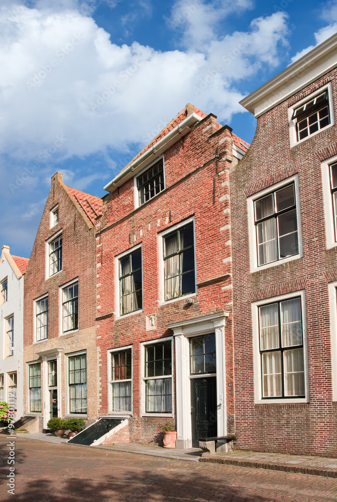 Street with row of ancient brickwork mansions, Veere, Netherlands
