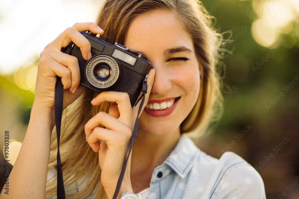 Hipster woman with retro film camera Hipster woman with retro film camera