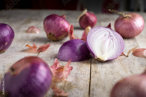 Shallot onions in a group on wood,still life