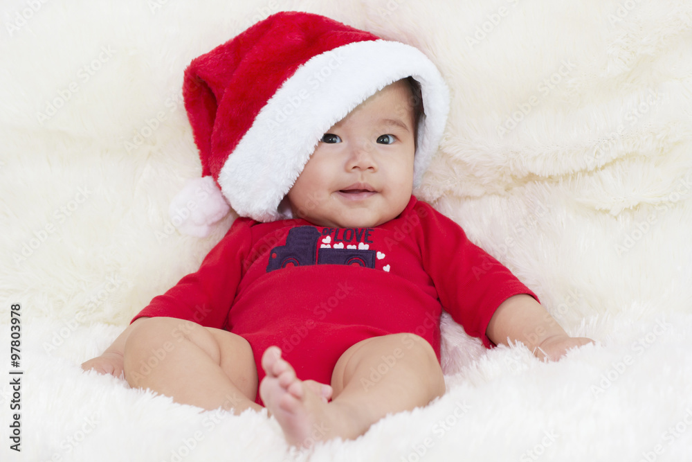 Baby with Santa hat. Merry Christmas and a happy new year with A Baby with Santa hat. Merry Christmas and a happy new year with A