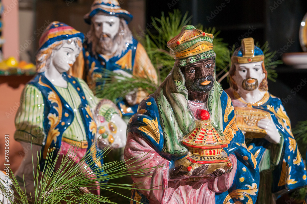 Painted pottery statue portraying one of the three wise men, work by a ceramic artisan in Caltagirone