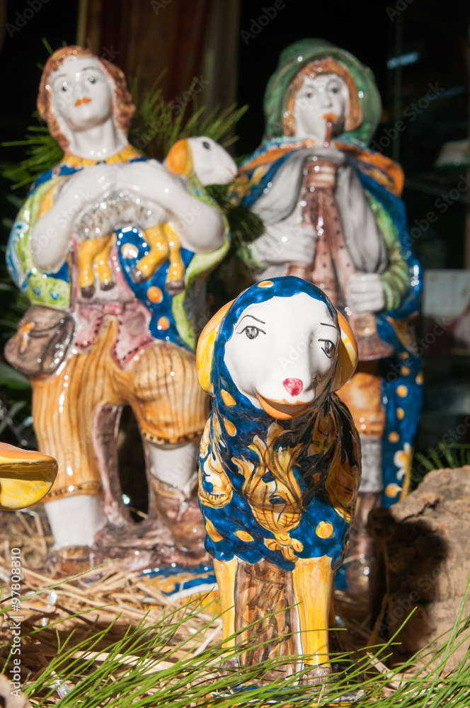 Painted pottery statue portraying a sheep in a ceramic nativity scene of an artisan in Caltagirone