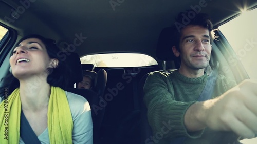 Happy loving family inside a car. 