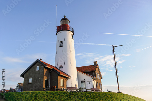 Lighthouse in Urk in the evening light, The Netherlands photo