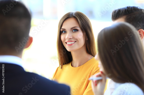 Smiling businesswoman with colleagues Free Download Smiling businesswoman with colleagues - GFXLoad