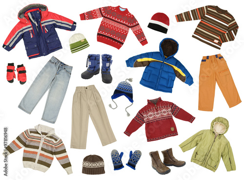 Color- and size-coordinated collection of boys winter clothes, isolated on white