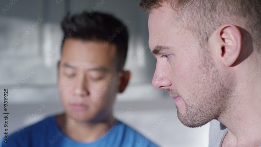 Relationship troubles. Portrait of gay couple having emotional conversation Relationship troubles. Portrait of gay couple having emotional conversation