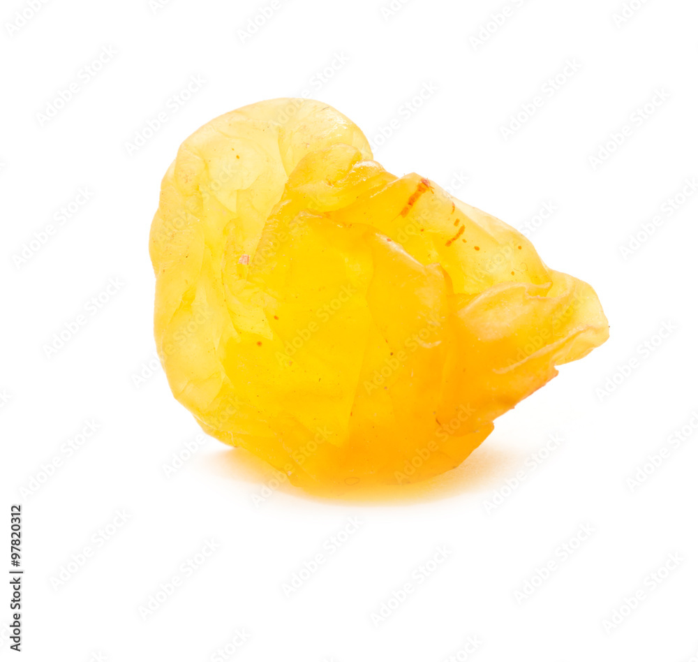 Golden raisins on a white background