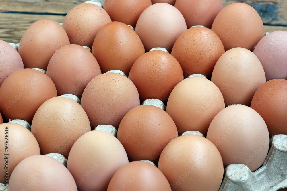 Chicken brown eggs in packing , the top view. Chicken brown eggs in packing , the top view.
