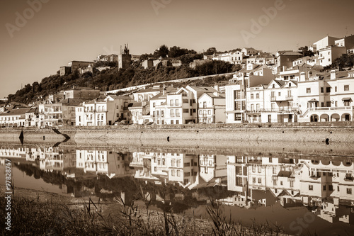 View of city Alcacer do Sal near the river Sado in Portugal © dvoevnore