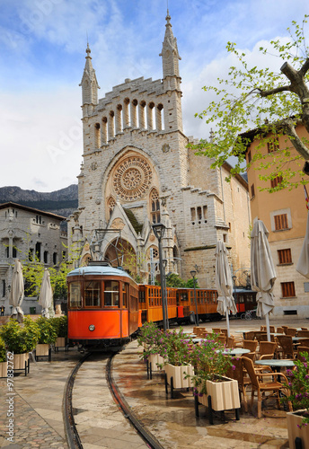 Old tram in front of the Cathedral of Soller, Mallorca, Spain