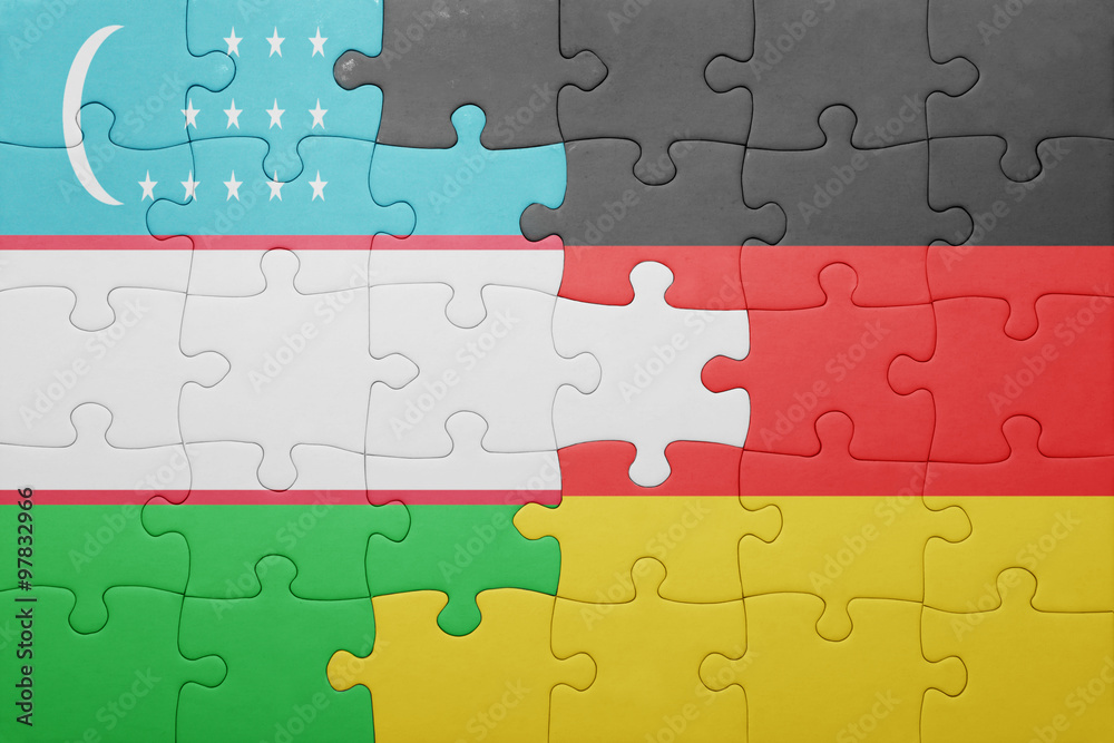 Fototapeta premium puzzle with the national flag of germany and uzbekistan