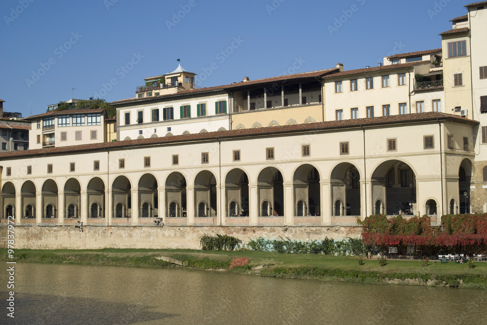 Florence old town buildings on the riverbank Arno