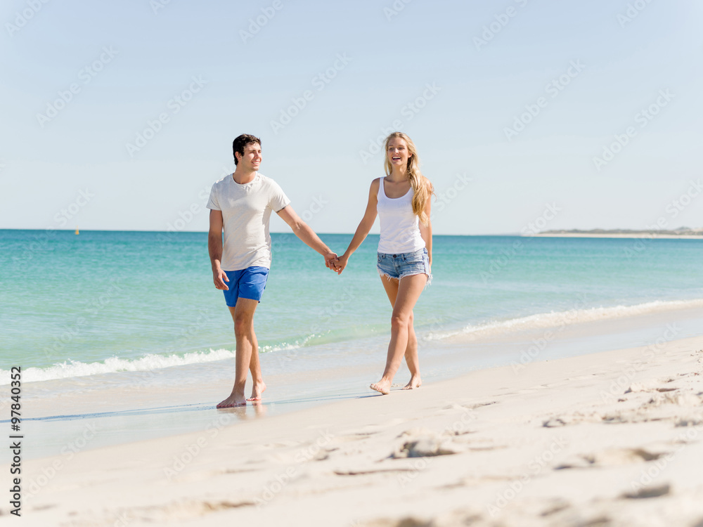 Romantic young couple on the beach