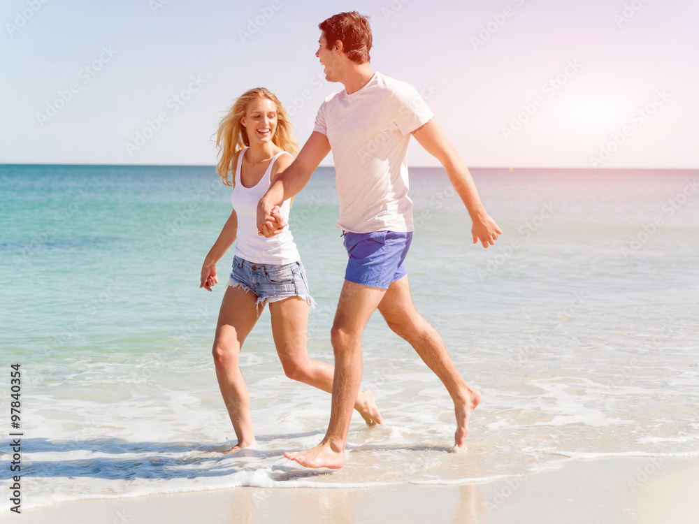 Romantic young couple on the beach Romantic young couple on the beach