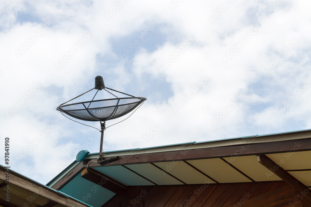 Satellite dish blue sky communication technology network on country home