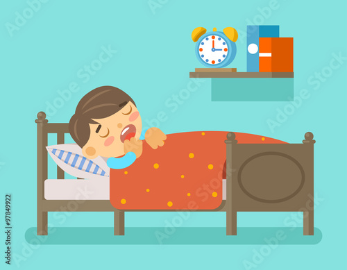 Boy sleeping in the bed