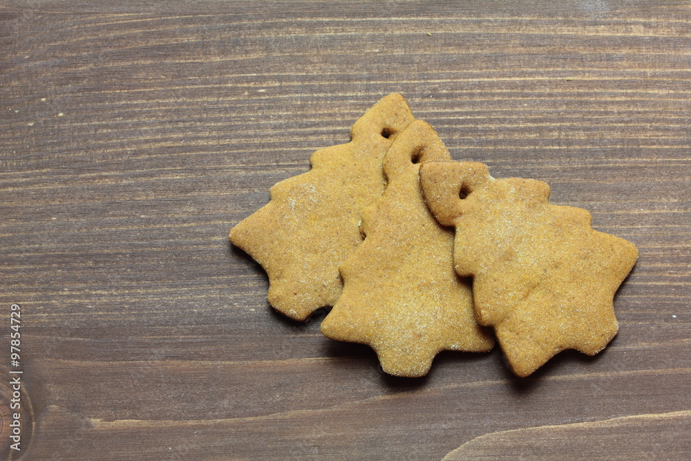 gingerbread on a wooden background gingerbread on a wooden background