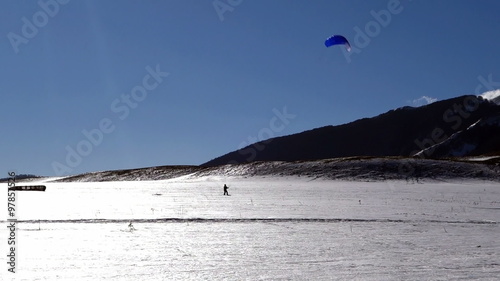  Snowkiting lessons in a snow-covered valley of Roccaraso, Italy photo