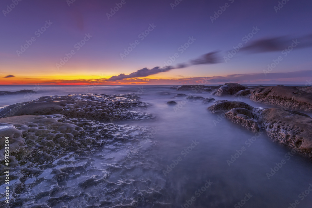 Australia sunrise over the sea and stone on the foreground