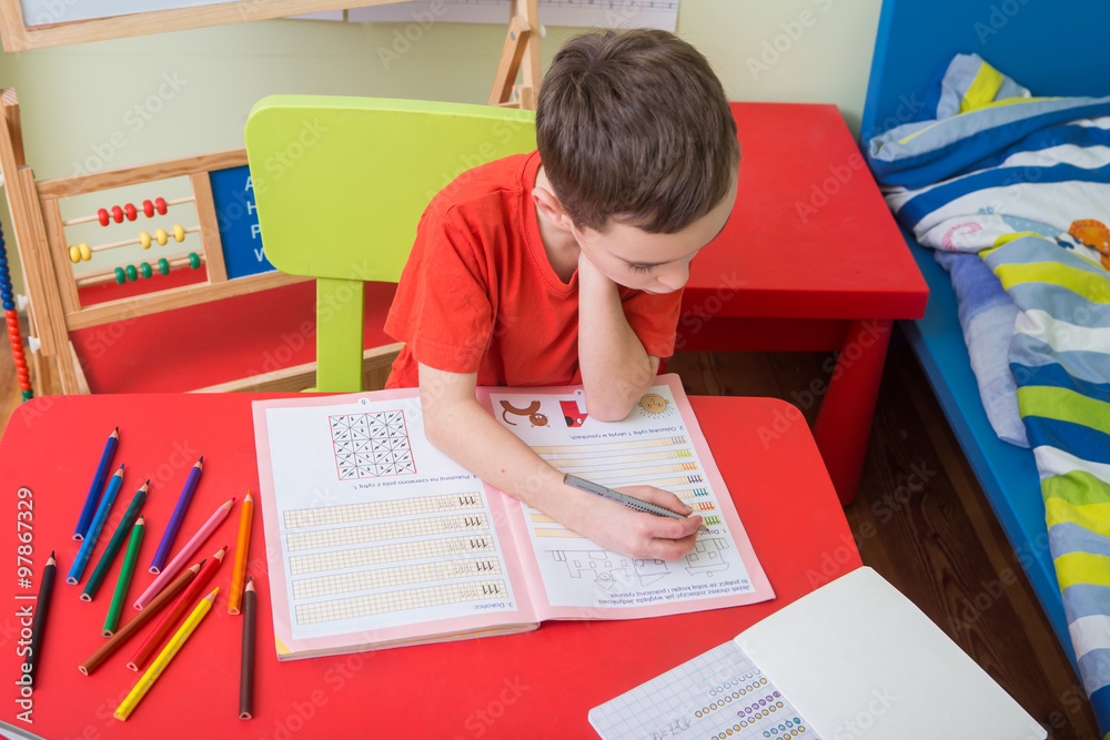 Boy doing homework
Boy doing homework