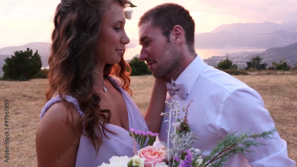 the bride and groom posing on the sunset the bride and groom posing on the sunset
