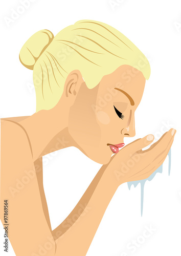 woman washing her face