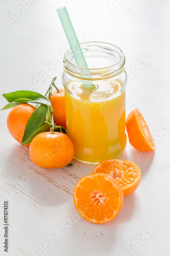 Mandarin juice in glass jar