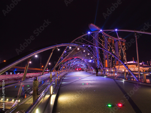 Helix Bridge in front of Marina Bay Building at Night