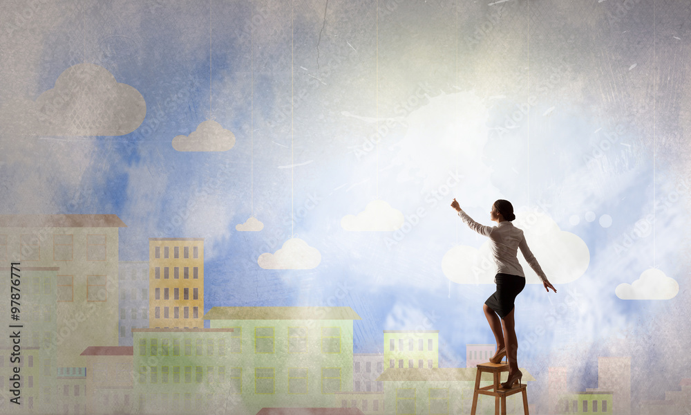 Woman reaching hand up