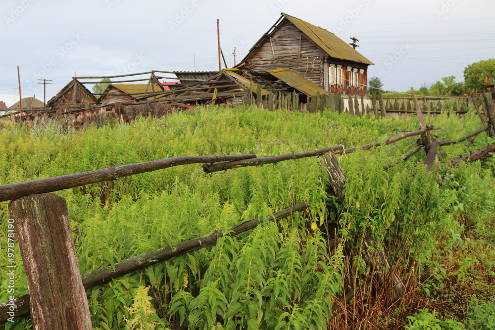 Very old wooden house in the remote Russian village in summer
