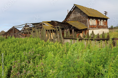 Very old wooden house in the remote Russian village in summer