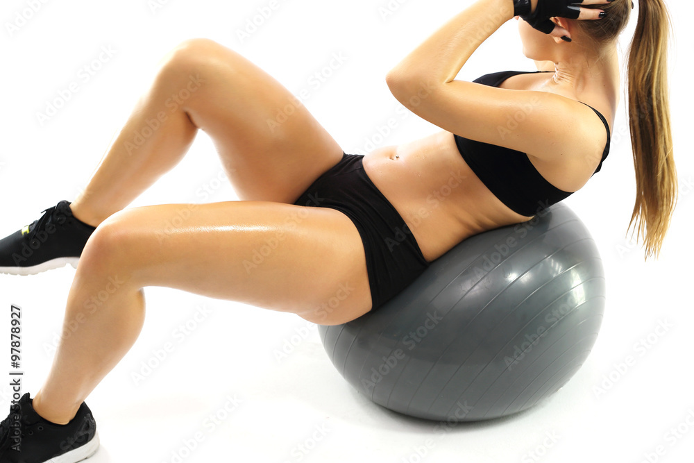 Naklejka premium Fitness, kobieta ćwiczy mięśnie brzucha