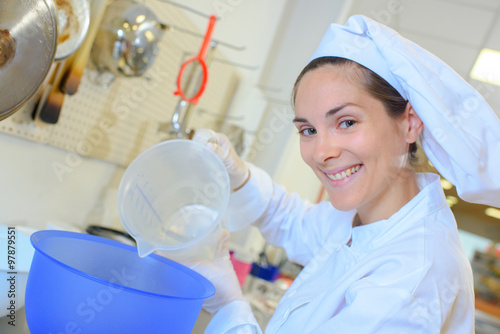 woman pouring water photo