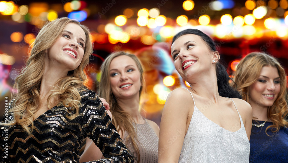 happy young women dancing at night club disco happy young women dancing at night club disco