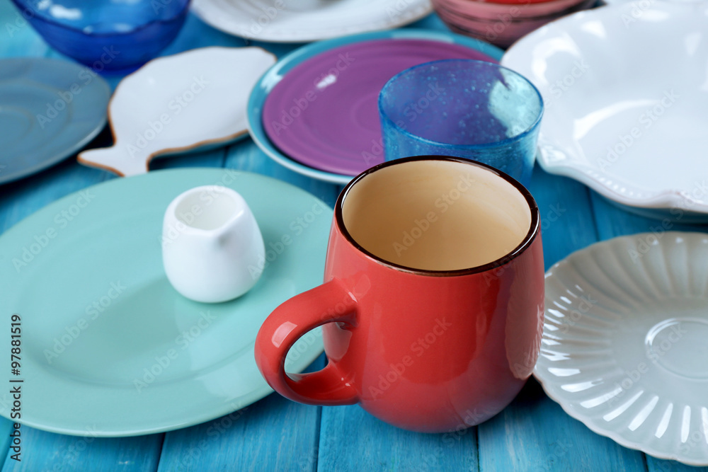 Different tableware on wooden table close up Different tableware on wooden table close up