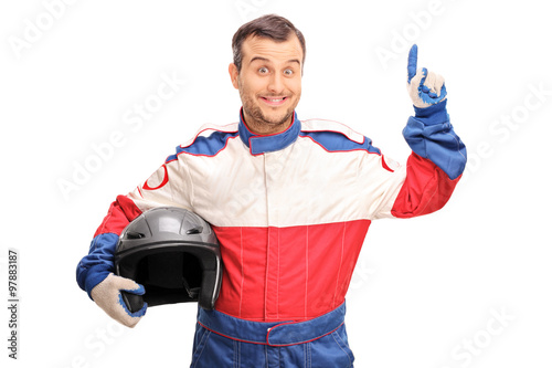 Young male car racer having an idea