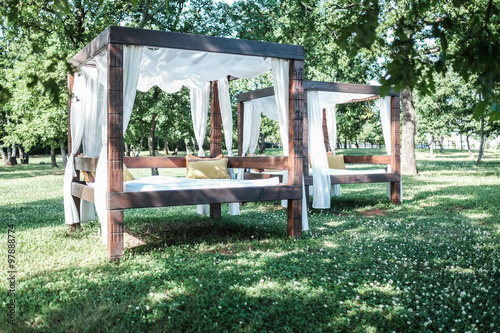 Tablou canvas Wooden arbour in the park