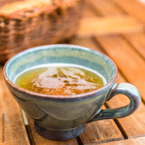 Norman apple cider in a typical ceramic cup photo