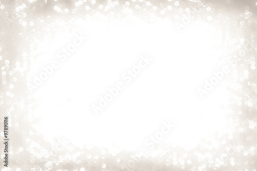 Christmas sparkling silver background with white space on the middle