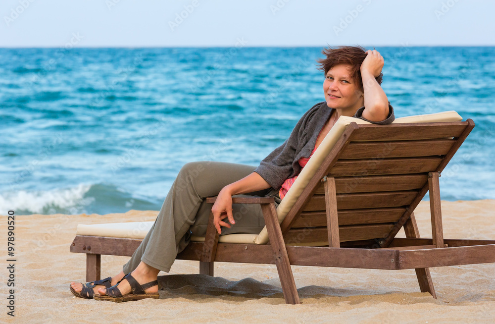 Woman on summer beach.
