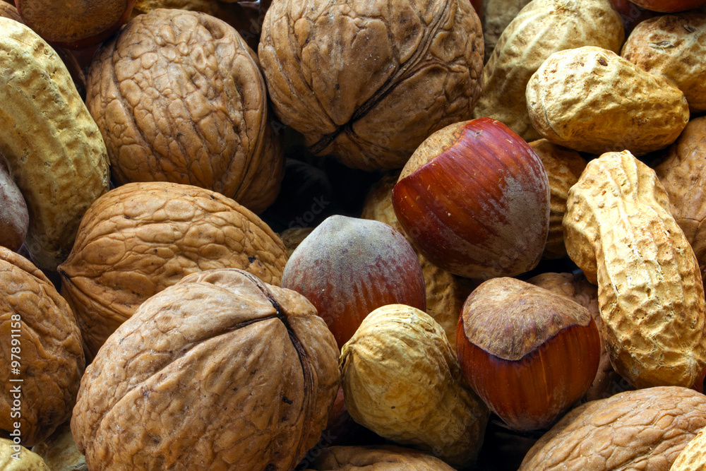 mixed nuts with hazelnut, peanut and walnut, closeup shot mixed nuts with hazelnut, peanut and walnut, closeup shot