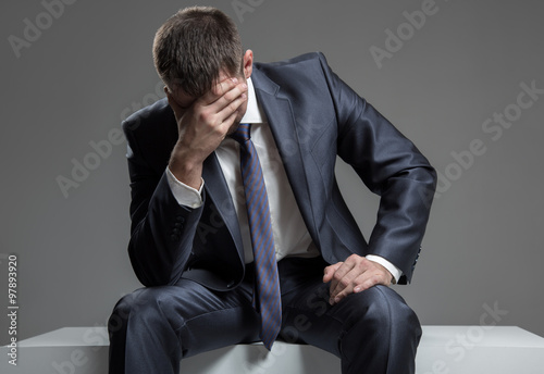 Businessman frustrated. Sign face palm.